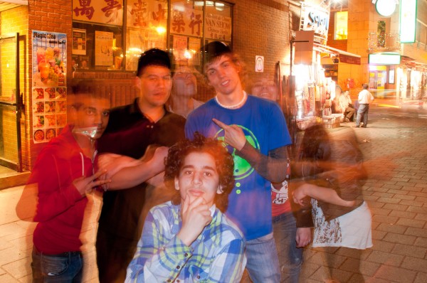 Young people in Chinatown, slow sync and ghosting